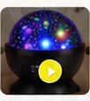 Galaxy star projector in a dark room